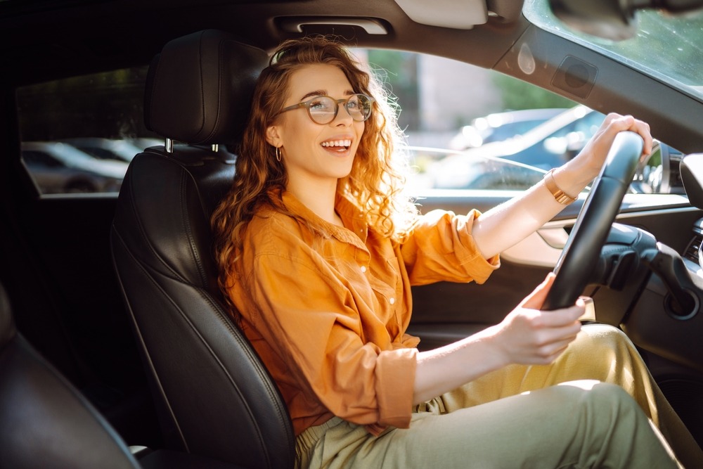 female driver happy to have her license back